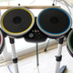 Illustration for article titled Rock Band 2 Wireless Guitar and Drums Hardware Review
